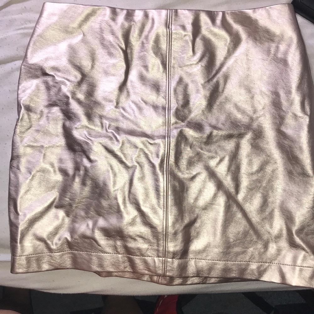 Pink metallic skirt.